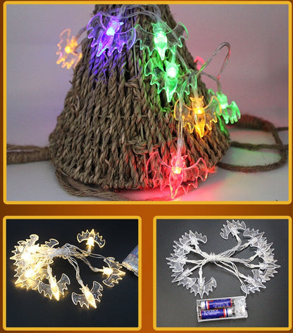 Halloween pumpkin LED string lights lantern decoration, glowing pumpkin-shaped lights on a dark wire