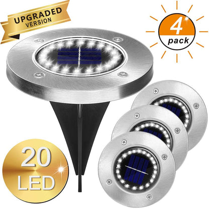 Eight LED waterproof solar powered garden lights with black stakes for outdoor landscaping lighting