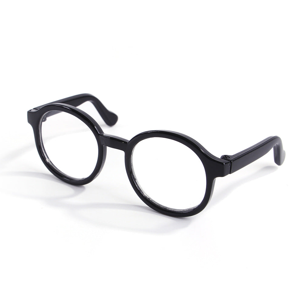 Transparent plastic cat glasses with round frames and playful cat-eye design