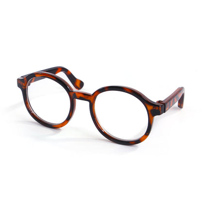 Transparent plastic cat-eye glasses frame close-up the foldable arms and clear lenses