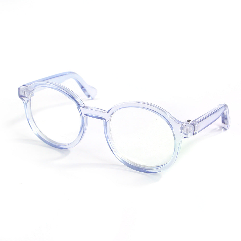 Transparent plastic cat-eye glasses with clear frames and tinted lenses