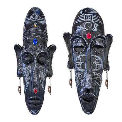 Resin tribal mask home decor with carved facial details and rustic finish