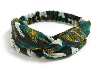 Women's retro style printed headband with colorful pattern, displayed flat for a clear view of the design