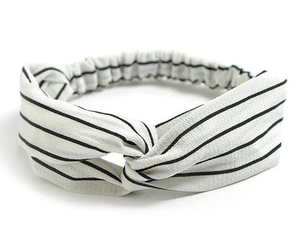 Women's retro style printed headband with colorful pattern and twisted fabric design