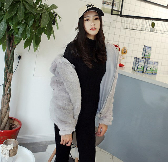 Women's faux fur mink coat in a soft, plush design for a stylish winter look