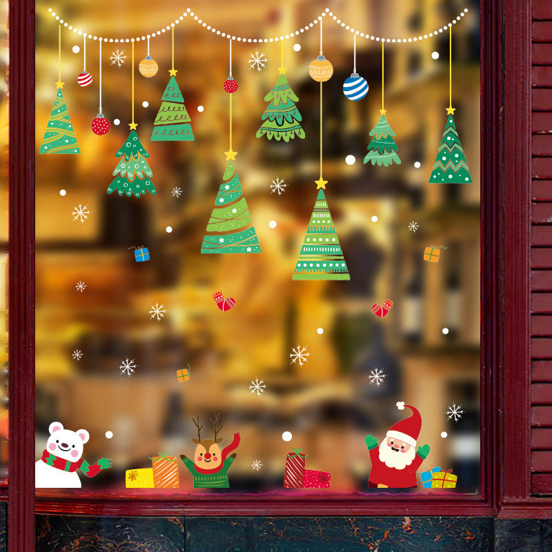 Christmas decorations store window stickers with festive holiday designs in red, green, and white