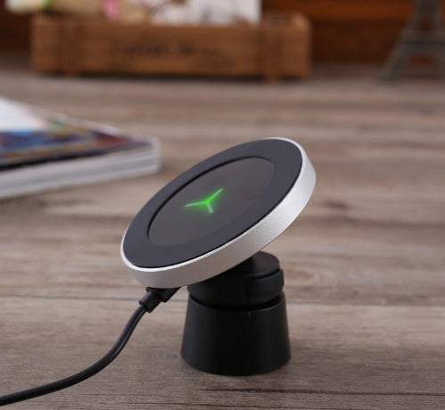 My Store car magnetic wireless charger mounted on a dashboard for convenient phone charging