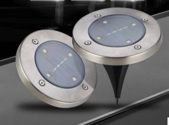 Eight LED waterproof solar powered garden lights in a set, designed for outdoor pathway illumination