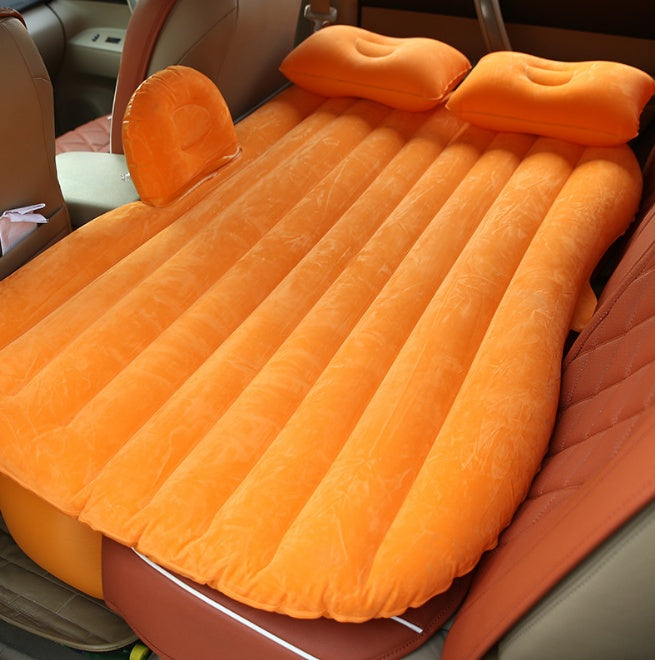 Inflatable car bed for comfortable sleeping and lounging during road trips
