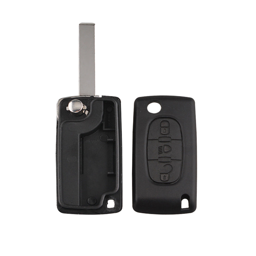 Peugeot car key viewed from the front with visible key blade and button housing