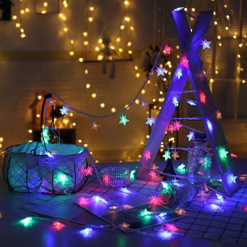 Starry LED lantern flashing string lights displayed in a room layout setup