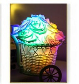 LED rose flower lights with glowing rose-shaped blooms on decorative stems