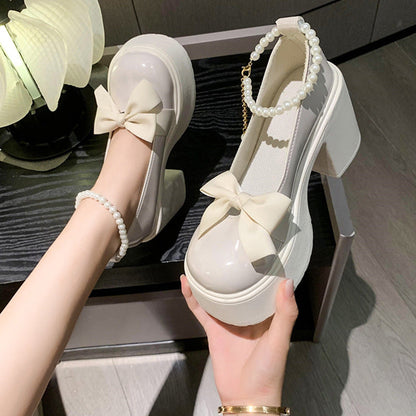 Pearl bow high-heeled leather shoes with elegant bow detail and pointed toe