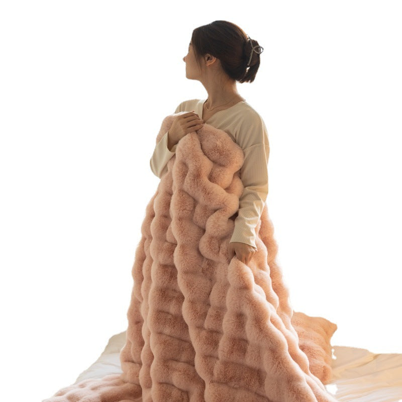Rabbit bubble velvet polyester carpet blanket quilt close-up in thickened nap texture