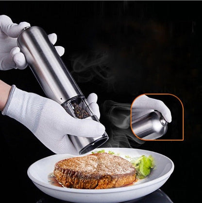 Stainless steel electric kitchen grinder with compact design and removable grinding cup