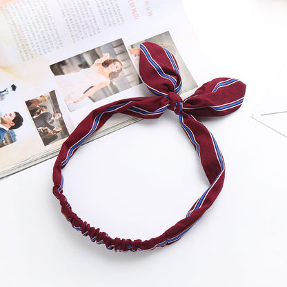 Big bow tie bunny ears headband in a playful design by My Store