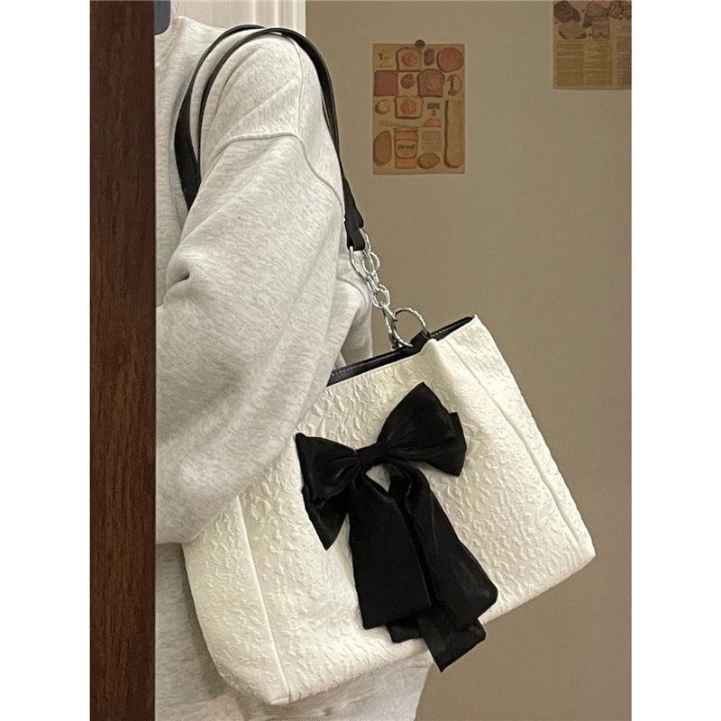 Large capacity canvas shoulder bag with bow detail in a tote design