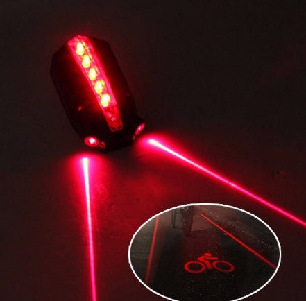 Bicycle laser taillight projecting red safety lines on the road
