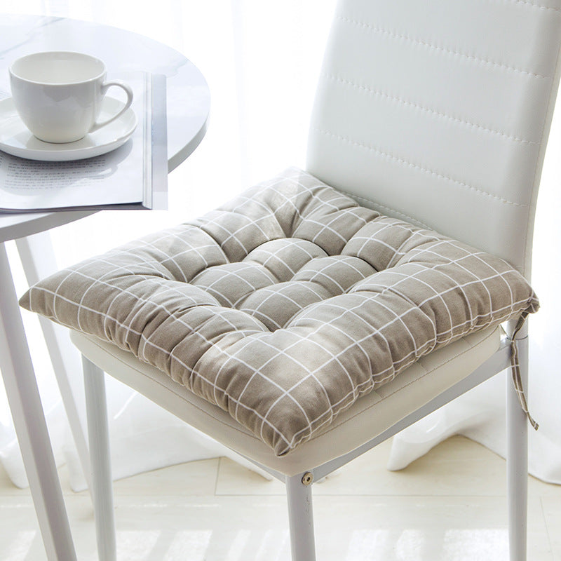 Summer chair cushion in a light, breathable fabric for outdoor seating