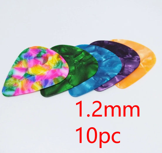Folk Bakelite ukulele guitar pick with vintage-inspired design.