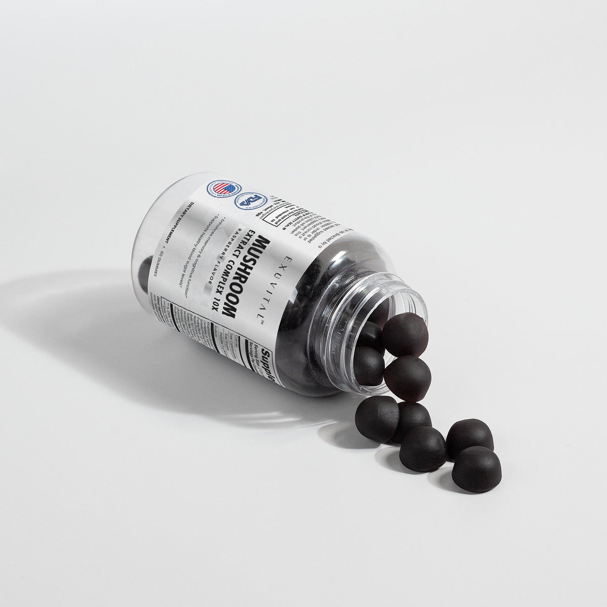 Label for Exuvital Mushroom Extract Complex, a supplement with various mushroom extracts in a clear bottle.
