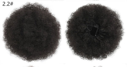 High puff ponytail hairpiece with voluminous textured curls displayed against a plain background