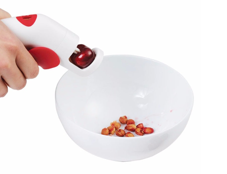 Cherry kernel remover creative kitchen gadget for pitting cherries by hand