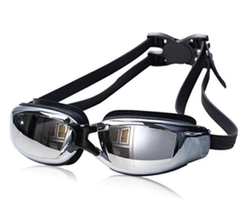 Waterproof swimming goggles with clear lenses and an adjustable strap