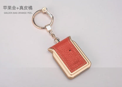 Dual SIM dual standby adapter keychain by My Store, compact design for mobile device connectivity