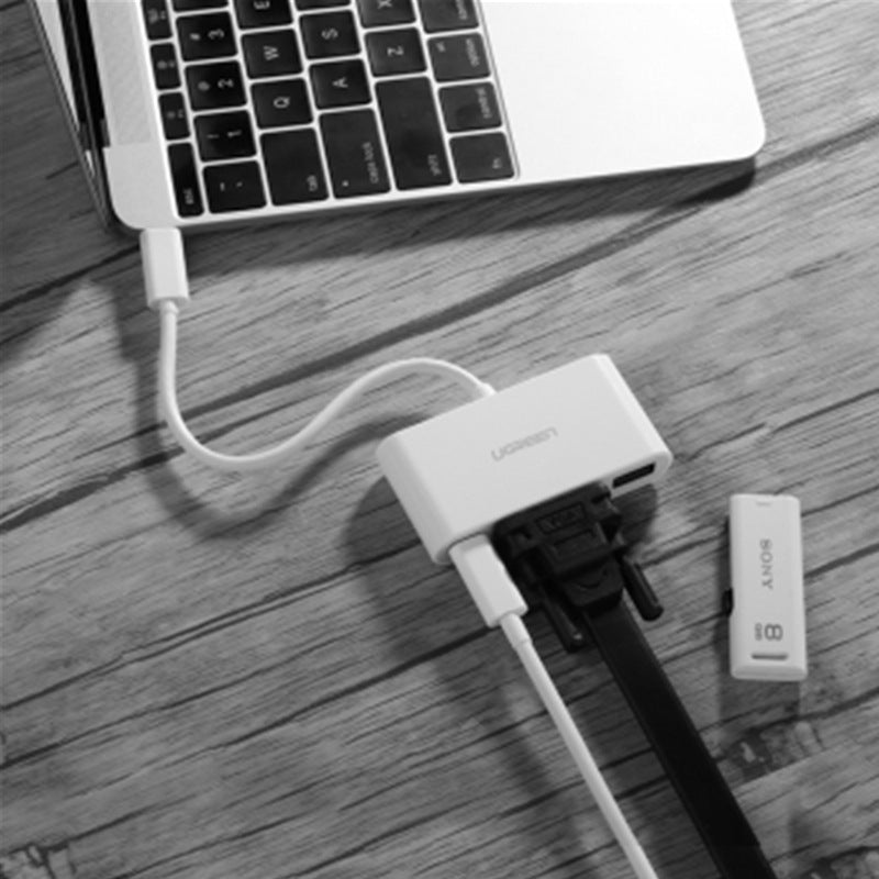 Notebook USB splitter hub with HD head, compact multi-port adapter.