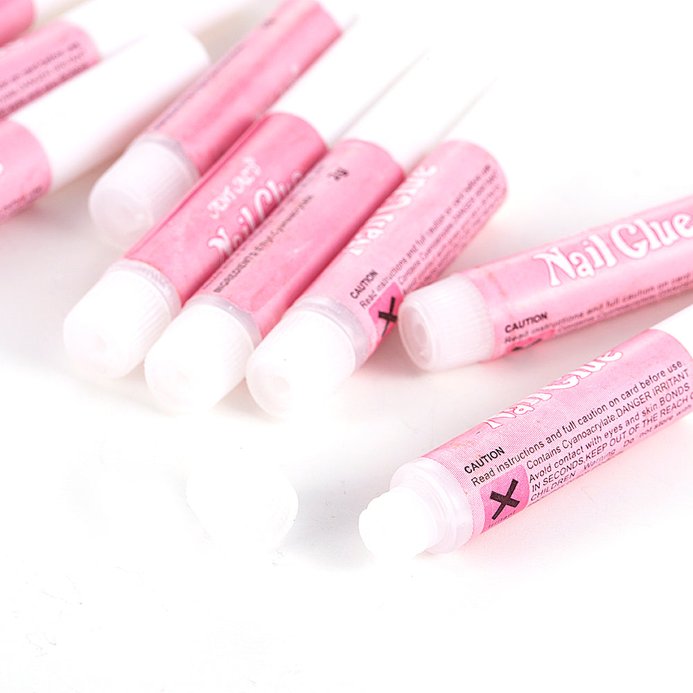 Nail art glue for personal use by My Store in a compact adhesive bottle