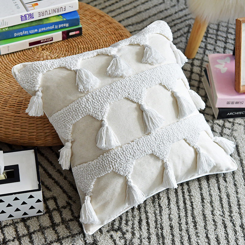 Nordic Moroccan tufted throw pillow with a simple textured pillowcase in a neutral design