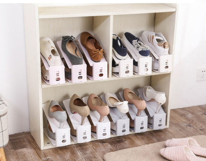 Shoe storage rack with multiple shelves for organizing footwear, shown in a compact freestanding design
