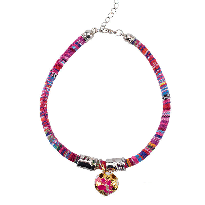 Ethnic-style bell collar with decorative detailing, shown against a clean background