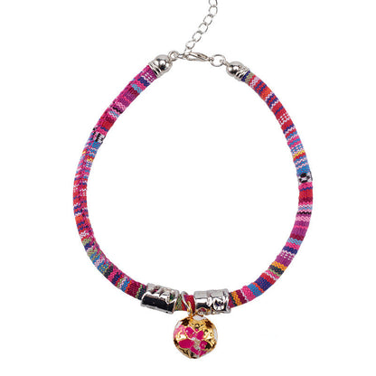 Ethnic-style bell collar with decorative detailing, shown against a clean background