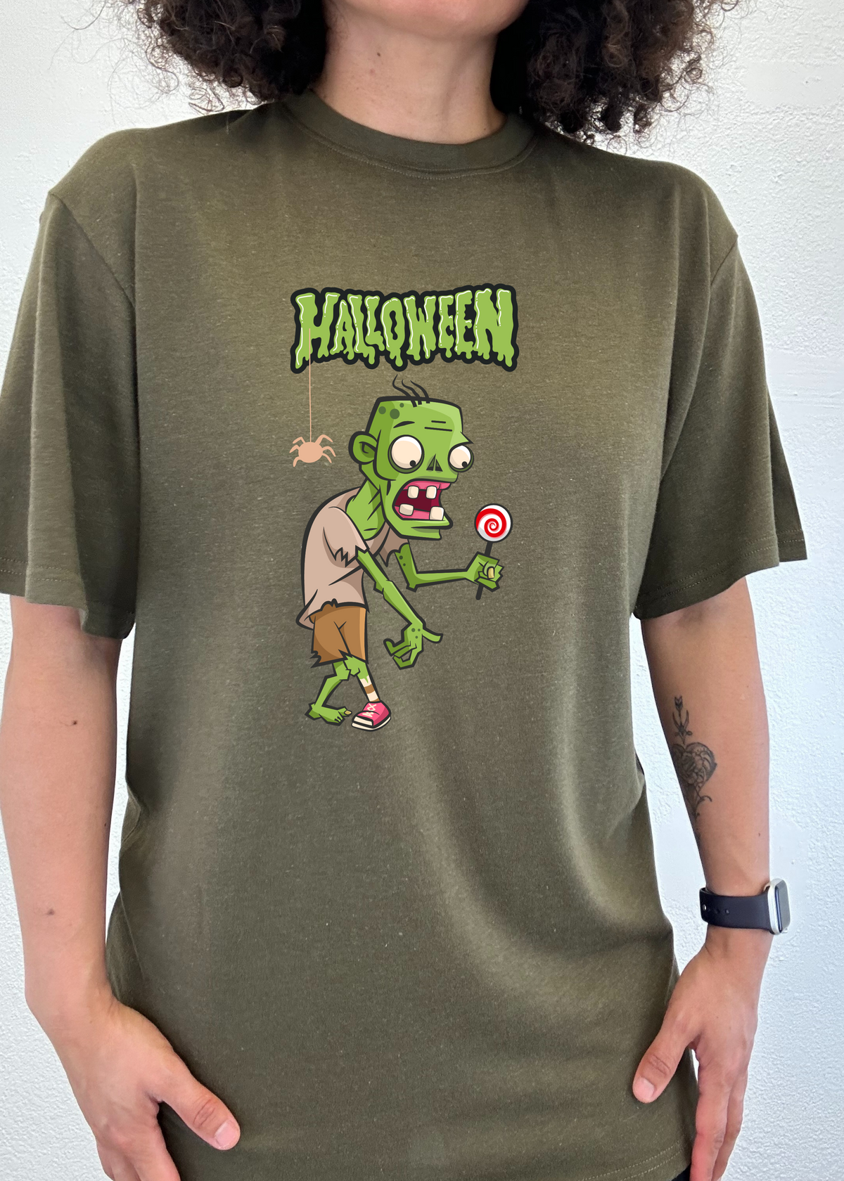 Men's Halloween Green Monster T-shirt by Spun Bamboo, short sleeve graphic tee with vibrant green monster design on organic cotton fabric.