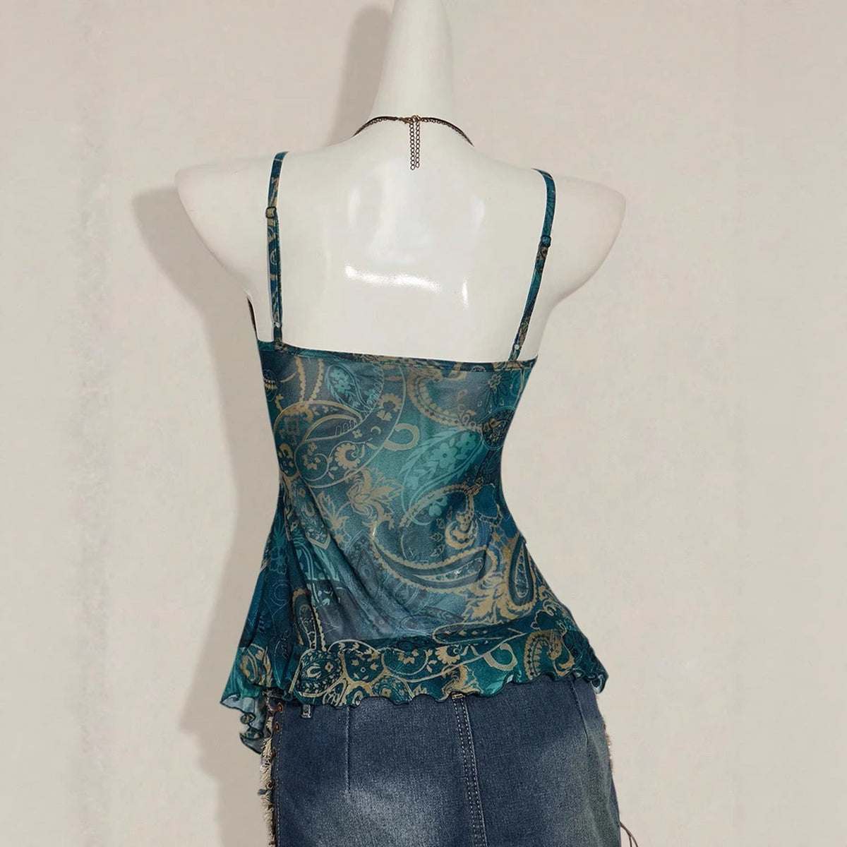 Floral-print mesh top with a figure-flattering fit and sheer fabric in a sexy style