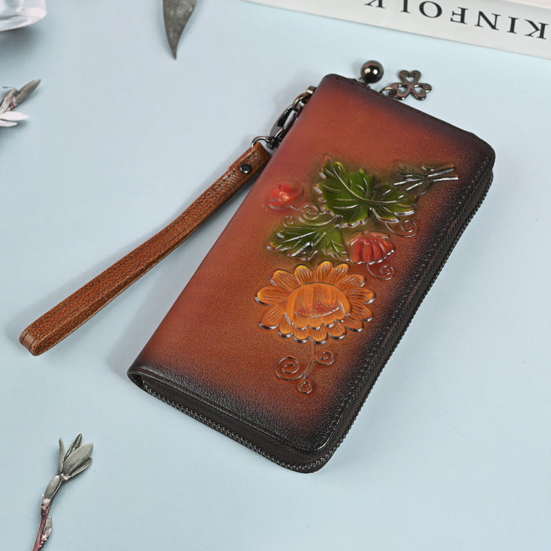 Embossed long wallet zipper clutch purse phone bag in a sleek fashion design