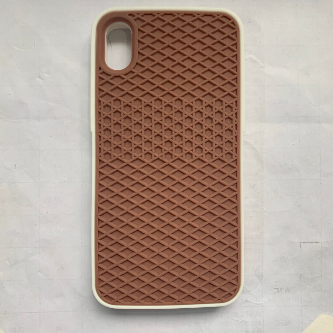 Waffle sole silicone phone case in textured rubber sneaker sole design