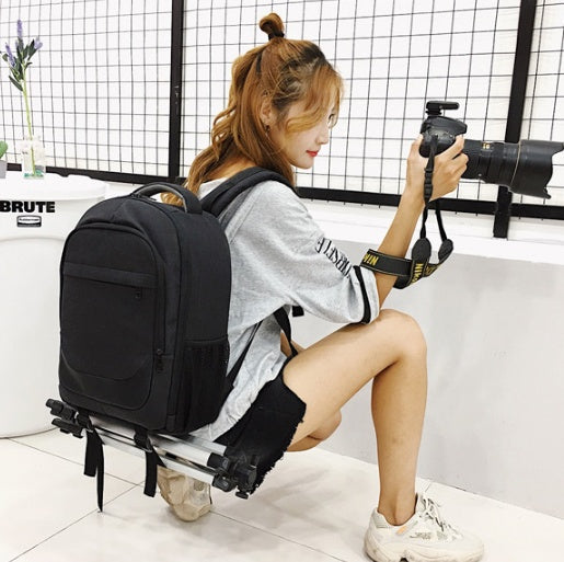 Custom waterproof camera laptop backpack with padded compartments and adjustable shoulder straps