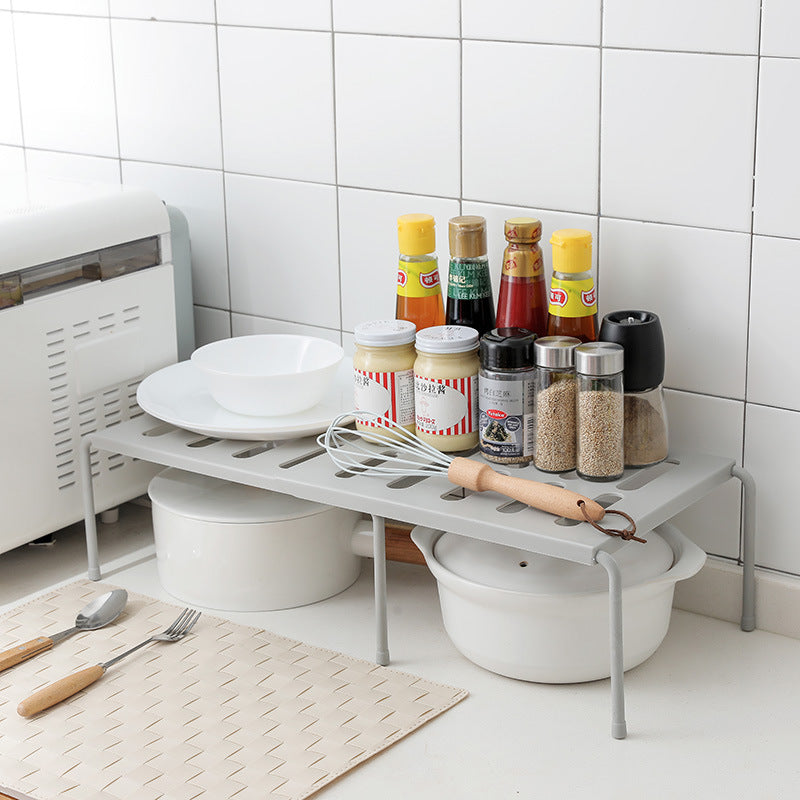 Telescopic kitchen rack for organizing kitchen supplies, adjustable storage shelf with a practical design