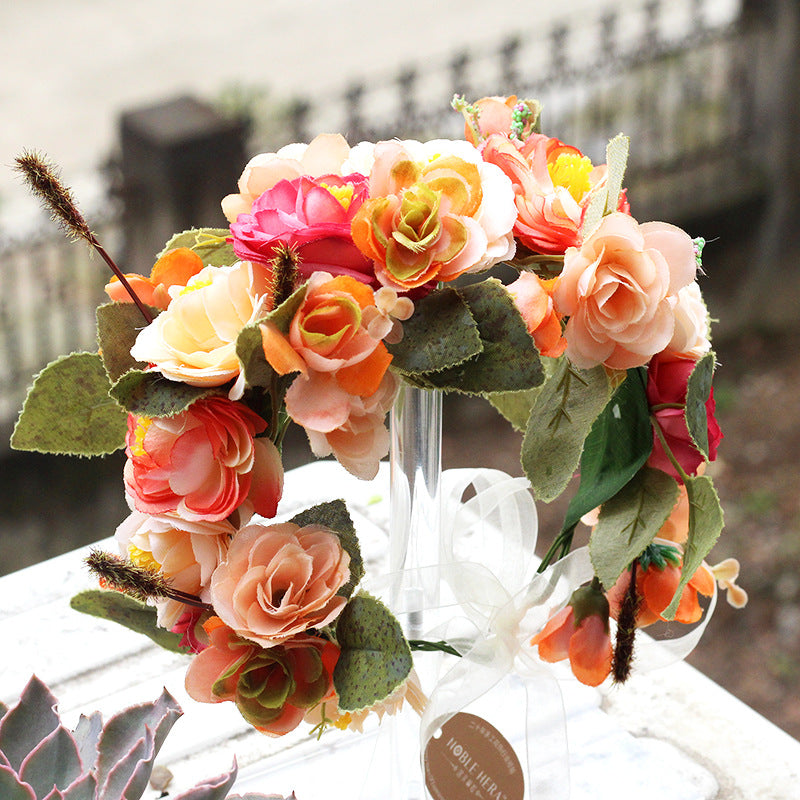 Wreath hair accessories displayed as decorative headpieces in a simple product image