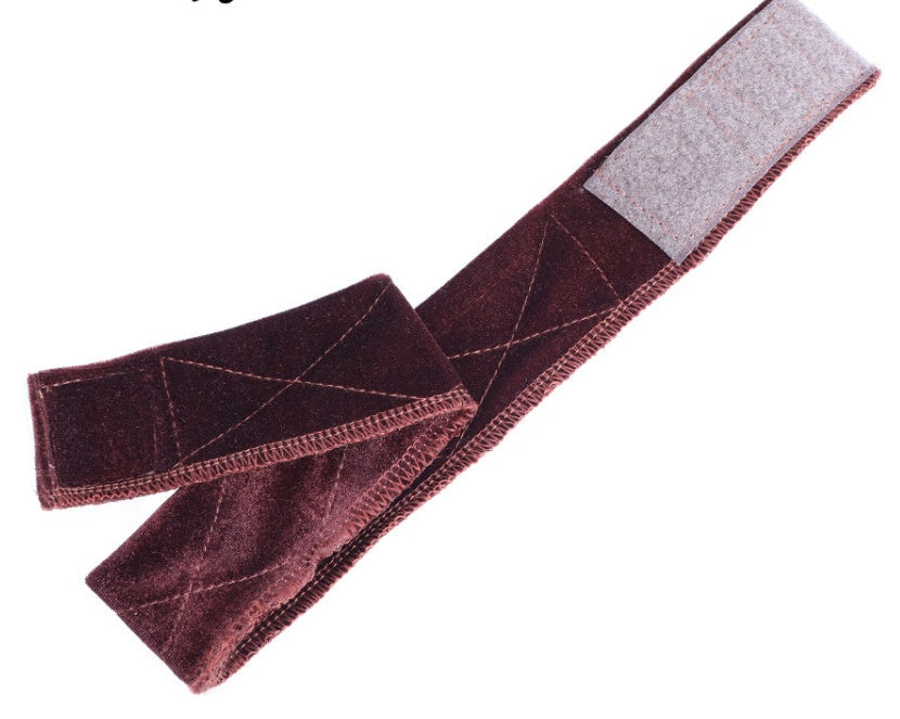 Flexible velvet adjustable wig grip headband in black, shown laid flat for a close-up view