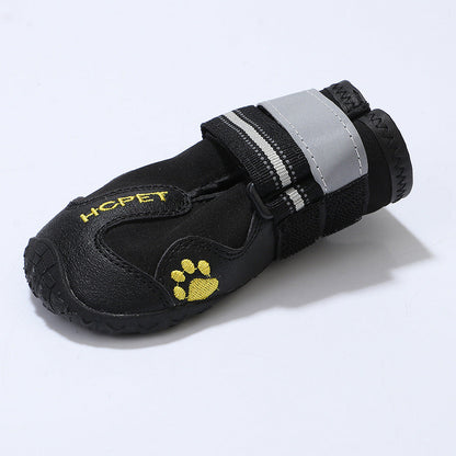Pet dog waterproof shoes in black, designed to protect paws from rain and wet conditions