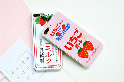 Strawberry phone case with red berry design and green leaves, shown on a smartphone-compatible case