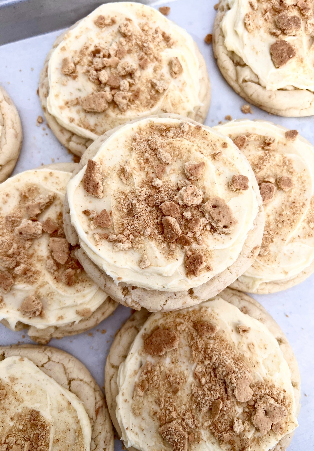 Let's Get Baked Artisan Desserts Key Lime Pie cookies, crispy cookies with lime flavor and creamy filling, on a white plate.