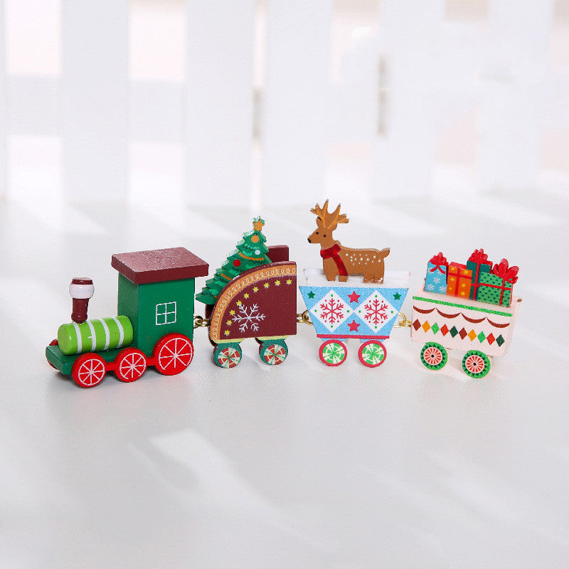 Wooden Christmas train decoration with festive holiday details, displayed as a seasonal ornament