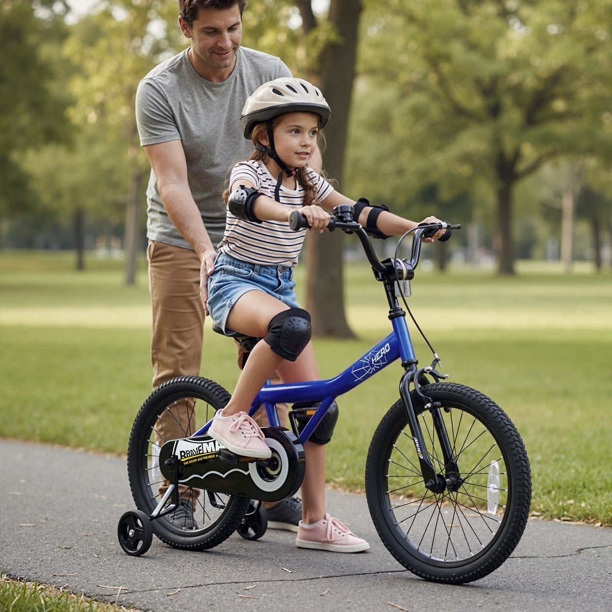 Kids 14-inch navy bike with removable training wheels, designed for children, featuring a sturdy frame and colorful details.