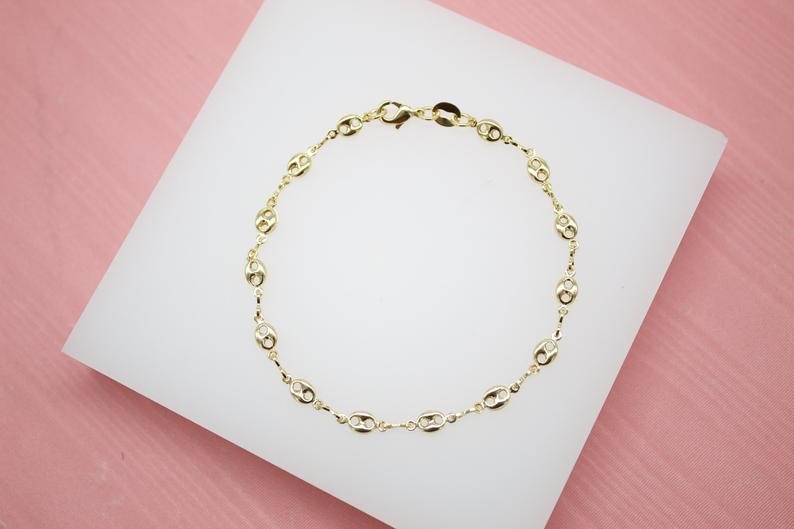 18K gold filled Gucci Mariner chain bracelet with 4mm links, stylish jewelry piece from MIA Jewelry.