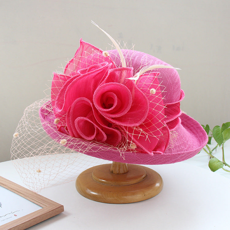 Banquet flower top hat with curled brim, detailed sun hat design viewed from the front